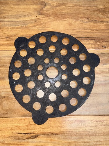 Antique trivet cast - cast,