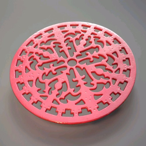 Cast iron trivet circular red - iron,